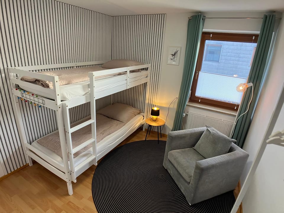 Seating area, Bedroom, bunk bed, washing machine