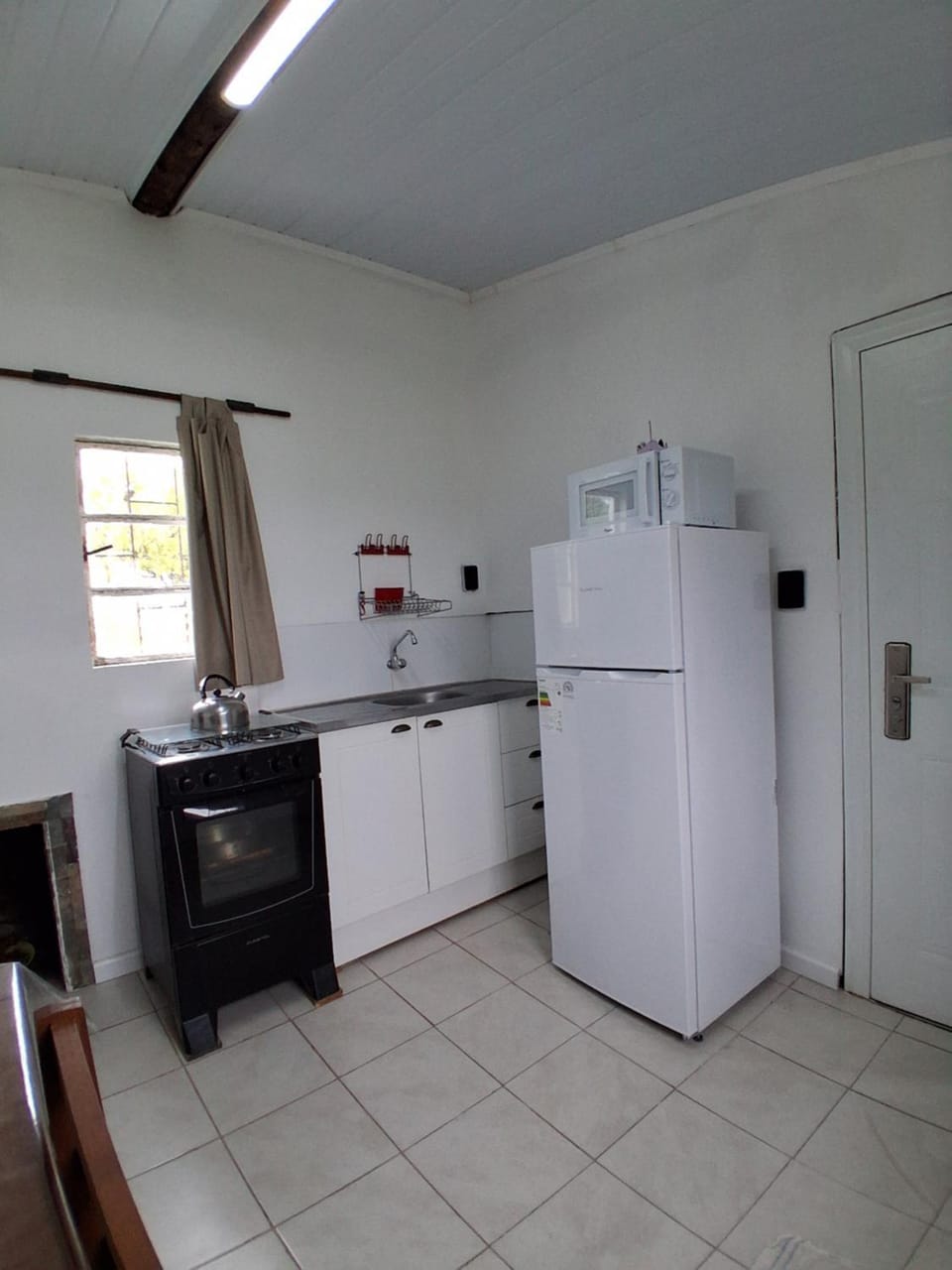Kitchen or kitchenette, oven