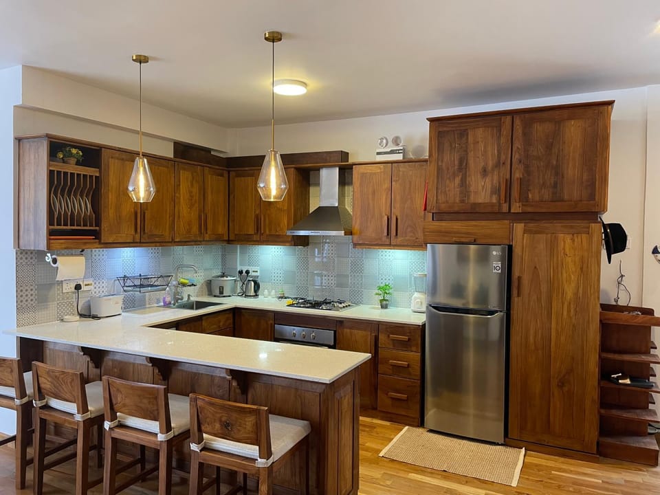 Kitchen or kitchenette, oven, stove