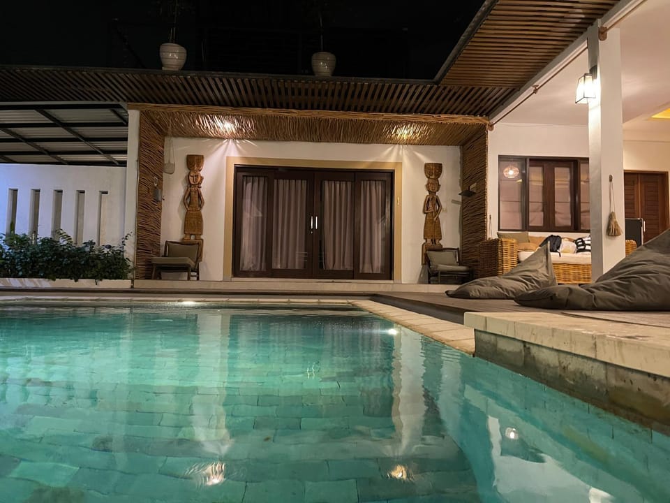 Patio, Night, Pool view, Swimming pool, sunbed
