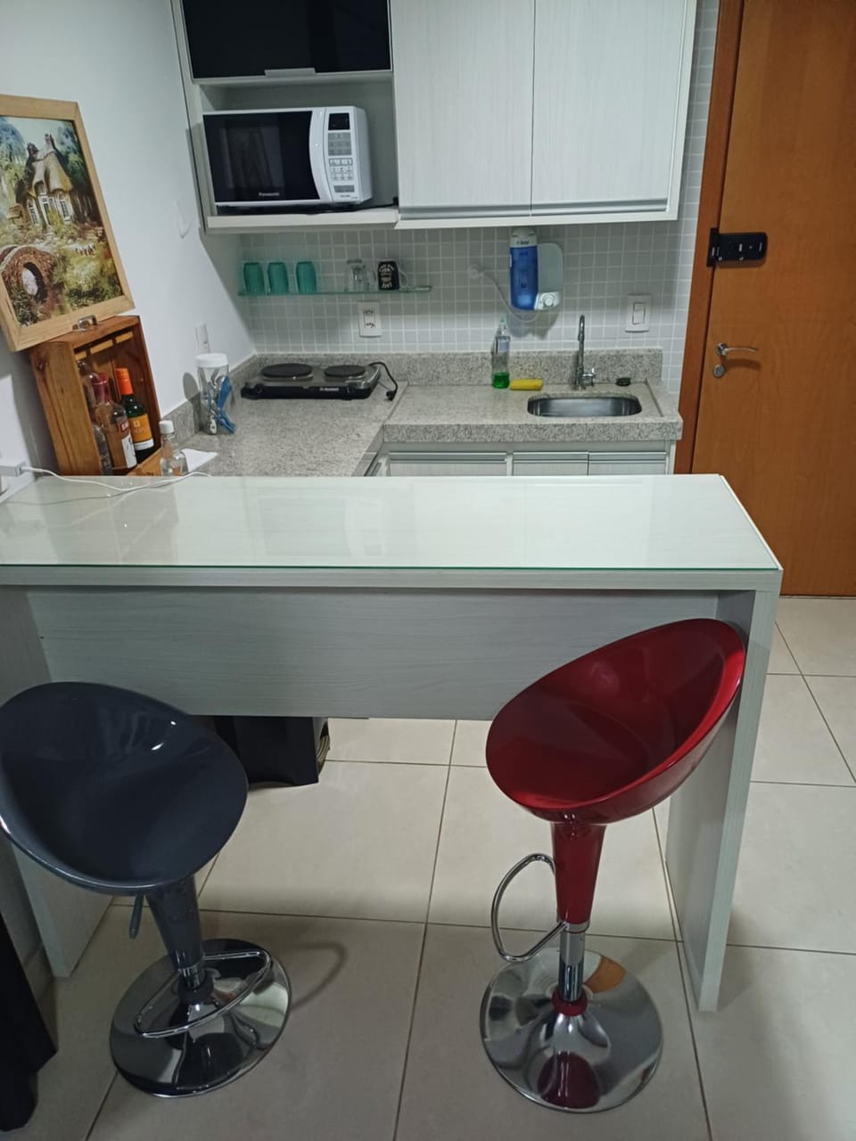 Kitchen or kitchenette, stove