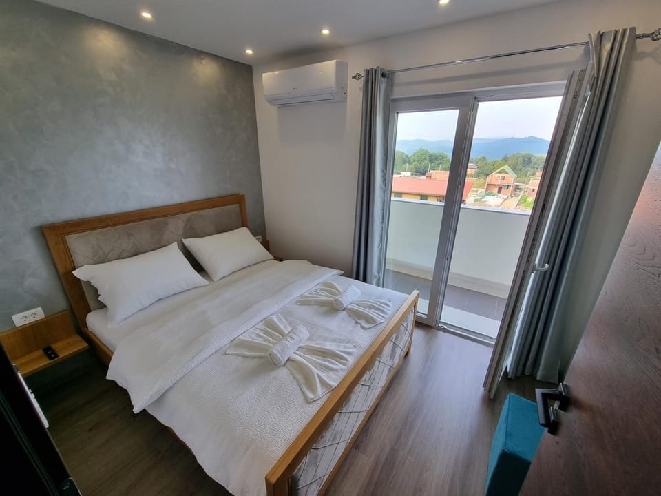 Bed, Photo of the whole room, Bedroom, towels, air conditioner