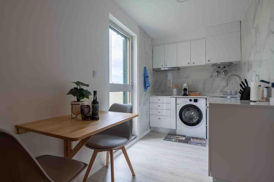 Dining area, stove, toaster, washing machine