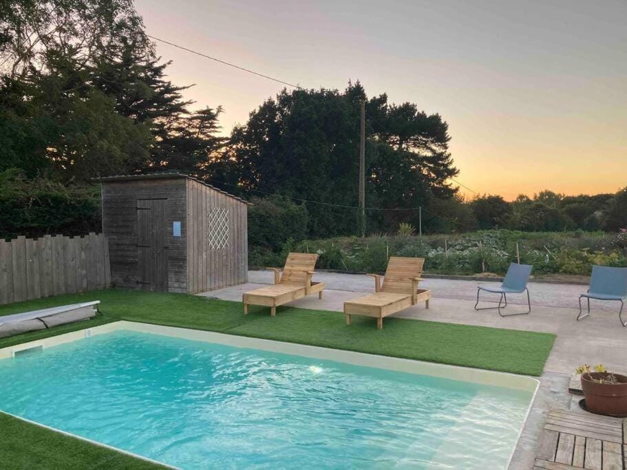 Patio, Natural landscape, Garden, Pool view, Swimming pool, sunbed
