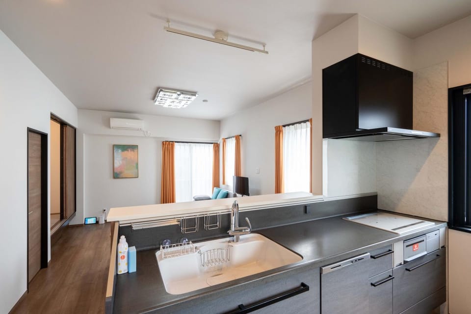 Kitchen or kitchenette, stove, air conditioner
