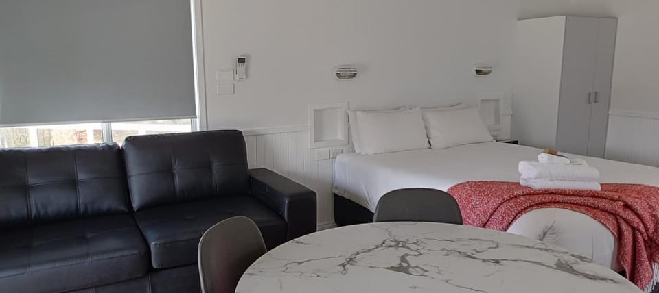 Bed, Living room, Seating area