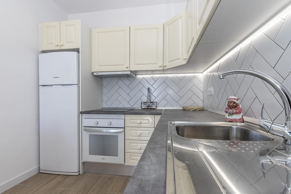 Kitchen or kitchenette, stove