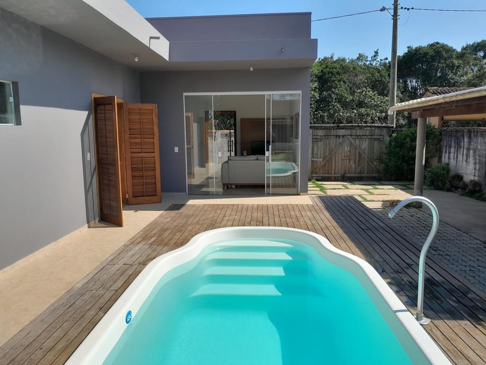 Property building, Patio, Day, Pool view, Swimming pool