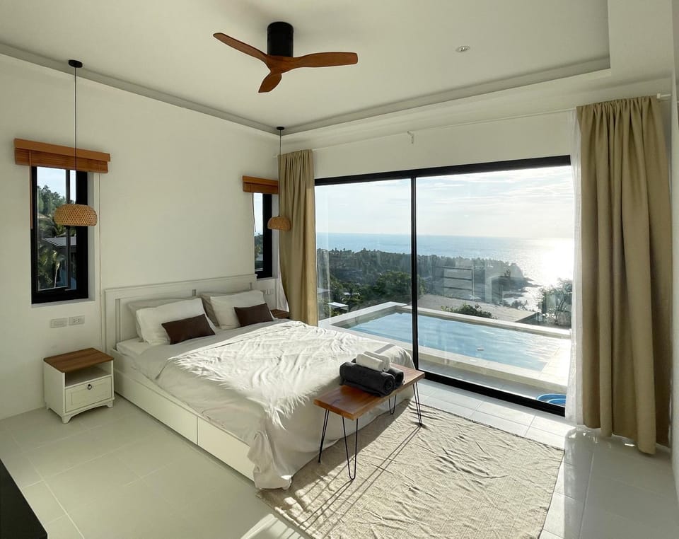 Bed, Natural landscape, View (from property/room), Balcony/Terrace, Photo of the whole room, Bedroom, Mountain view, Pool view, Sea view, Swimming pool, fireplace, sunbed