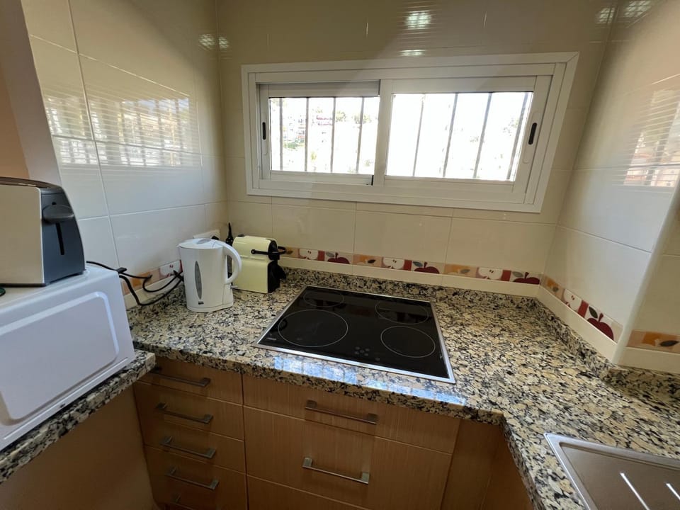 Kitchen or kitchenette, stove