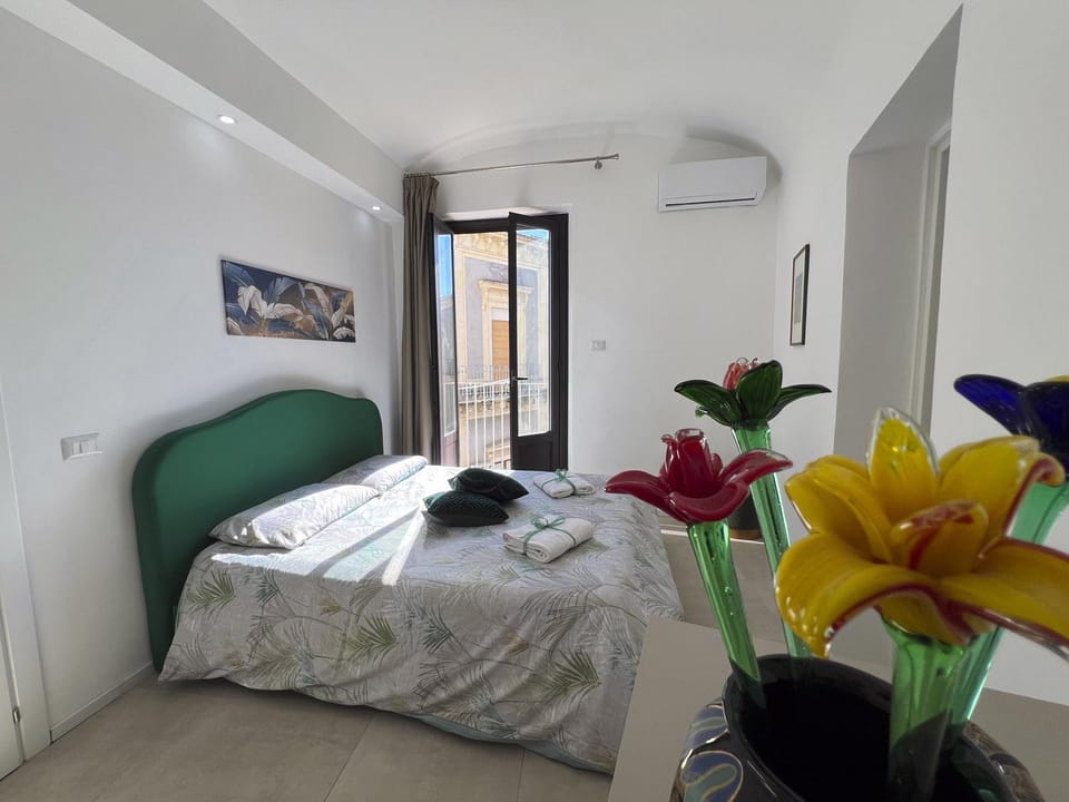 Bed, Photo of the whole room, Bedroom, towels, air conditioner