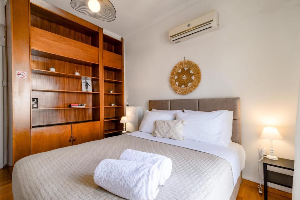 Bedroom, towels, wardrobe, air conditioner