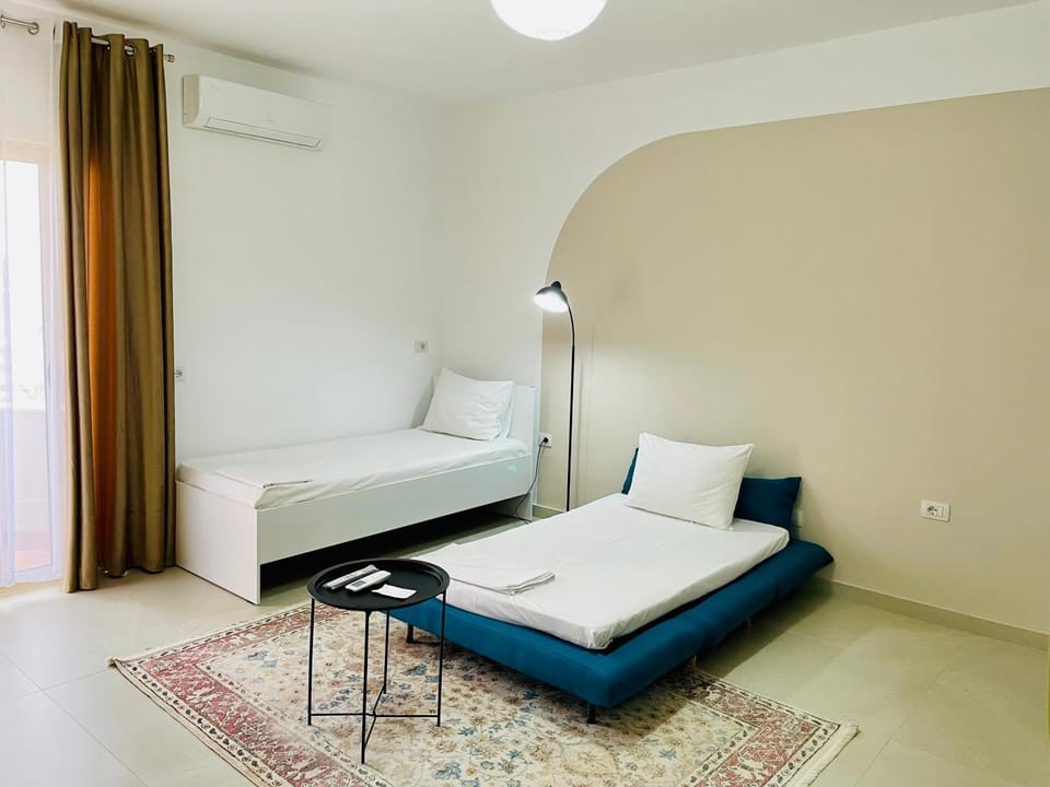 Bed, Living room, Photo of the whole room, Seating area, Bedroom, towels, air conditioner