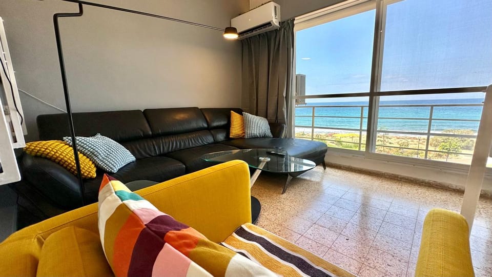 View (from property/room), Living room, Seating area, Sea view