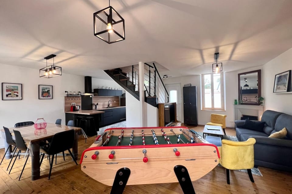 Property building, Game Room, Living room, Seating area, Dining area