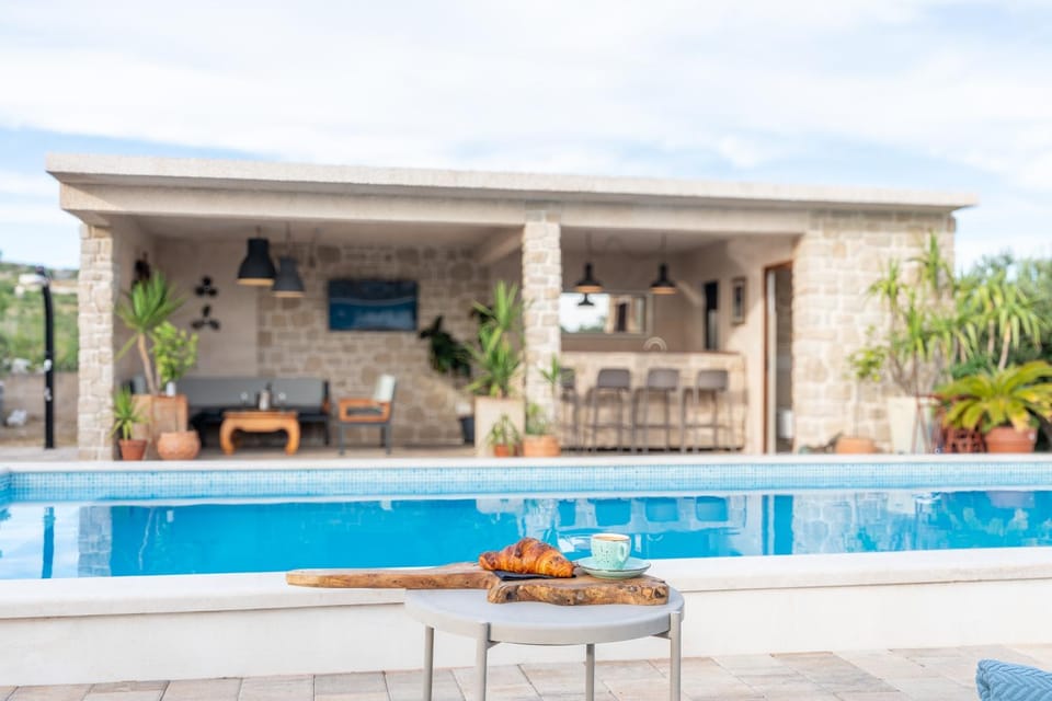 Toilet, Property building, Patio, Day, View (from property/room), Balcony/Terrace, Seating area, Pool view, Swimming pool, sunbed