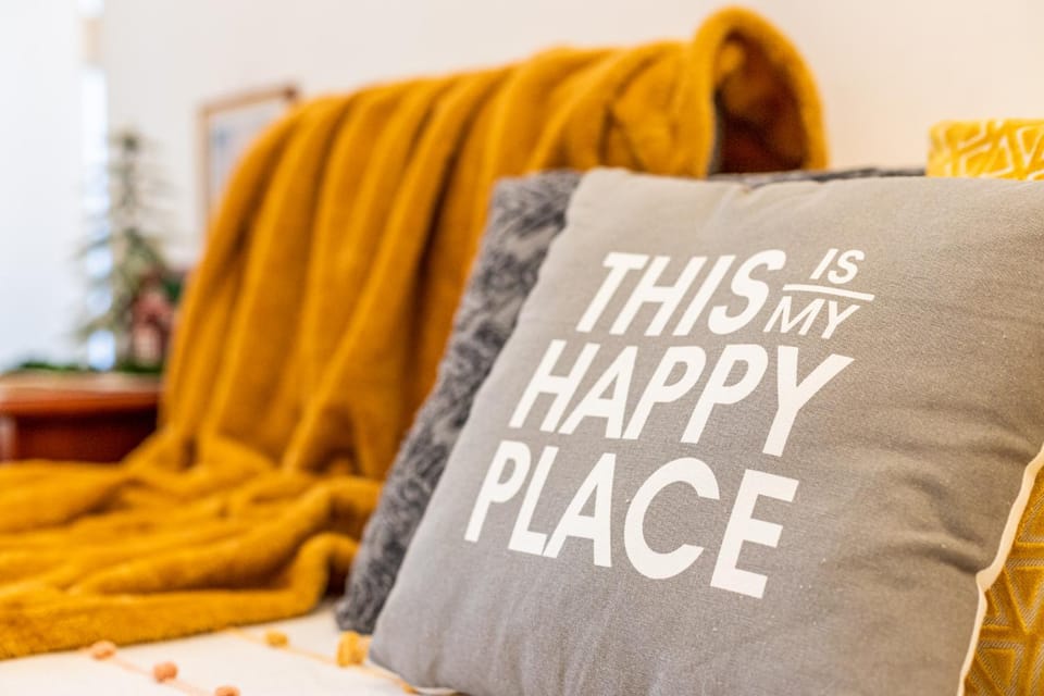 Living room, Seating area, Text overlay