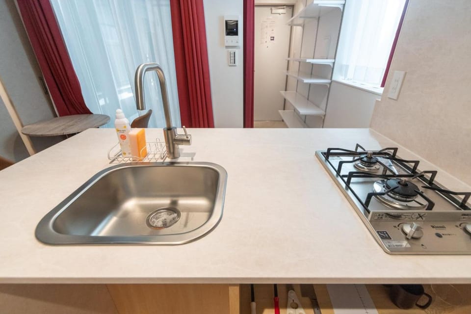 Kitchen or kitchenette, stove