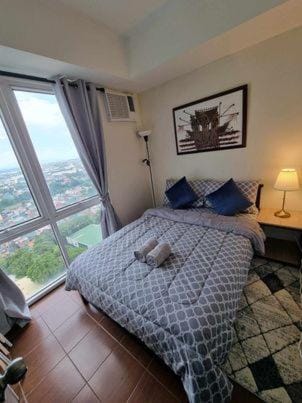 Bed, Photo of the whole room, Bedroom, towels, air conditioner