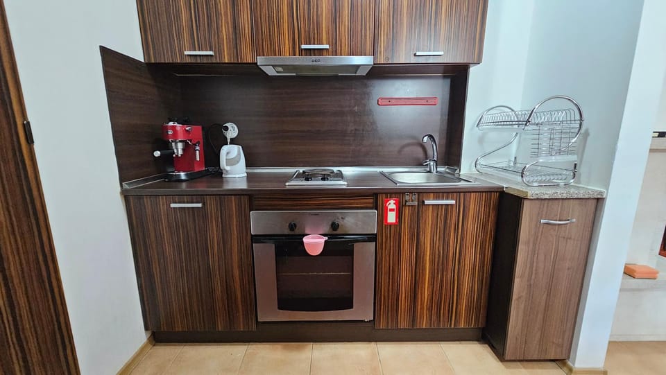 Kitchen or kitchenette, oven, stove