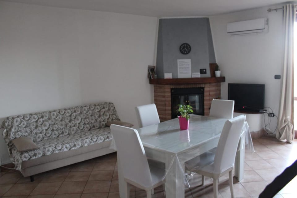 TV and multimedia, Living room, Dining area, fireplace, furniture, air conditioner