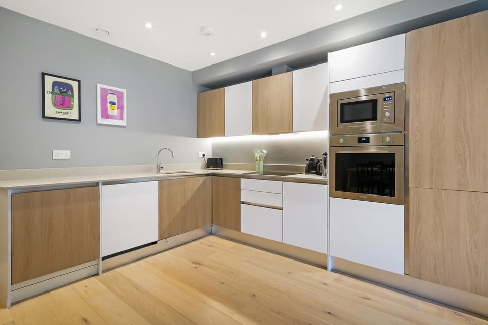 Kitchen or kitchenette, dishwasher, oven, stove, toaster