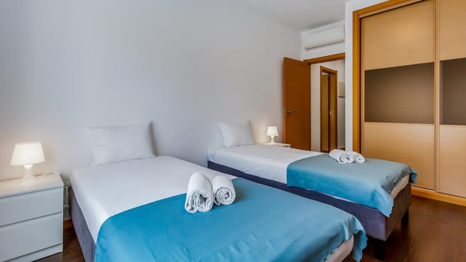 Bed, Photo of the whole room, Bedroom, towels, air conditioner