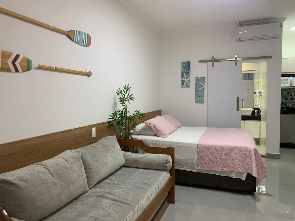 Bed, Living room, Seating area, Bedroom, air conditioner