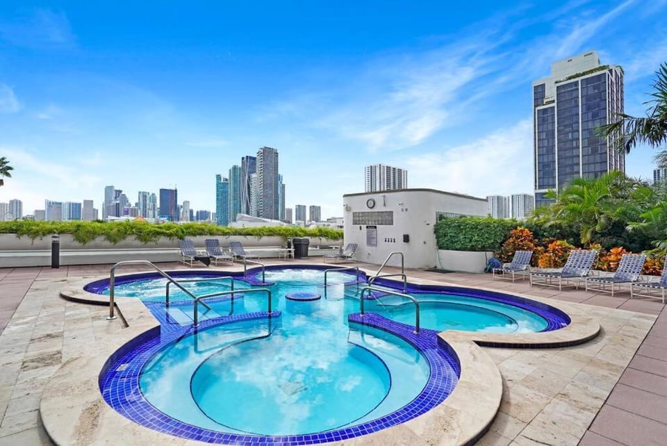 Property building, Hot Tub, City view, sunbed