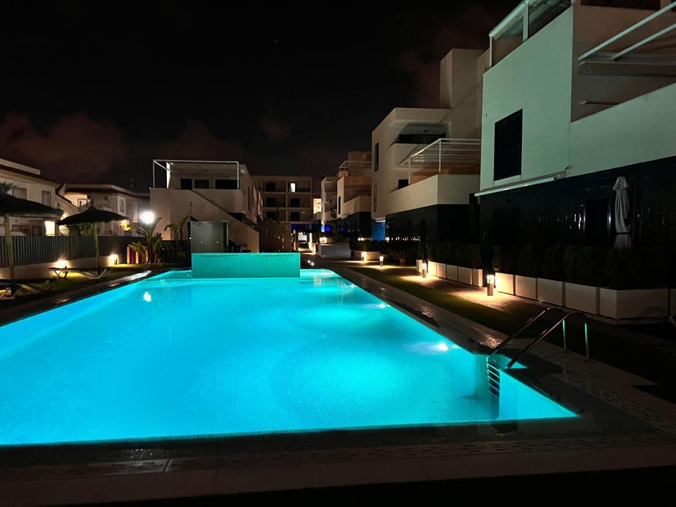 Property building, Night, Swimming pool
