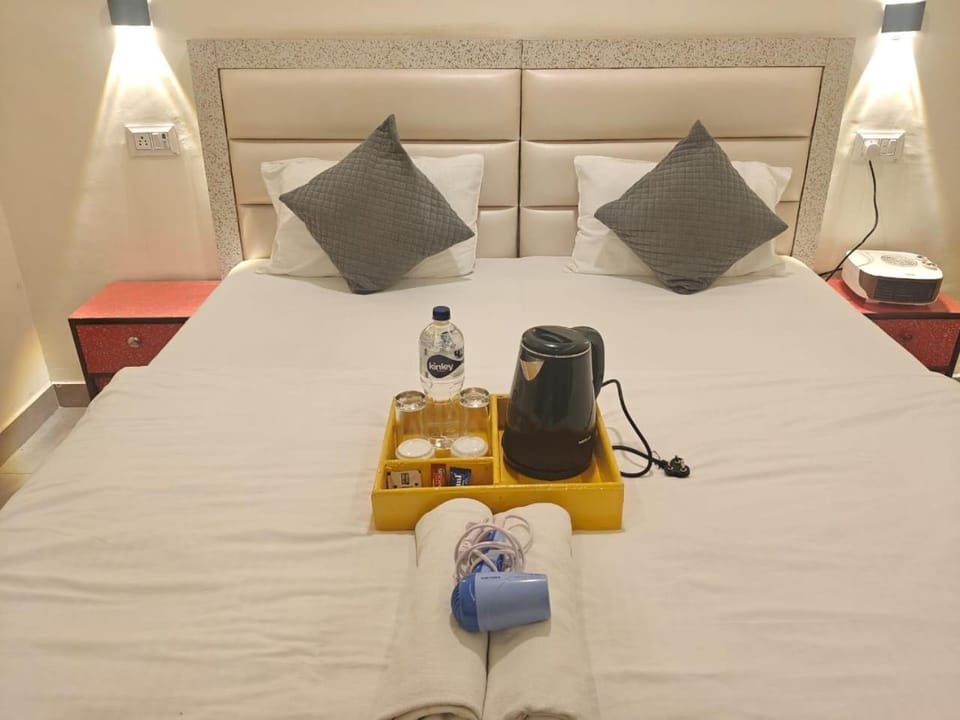 Bed, Coffee/tea facilities, Kitchen or kitchenette, Photo of the whole room, Bedroom, towels