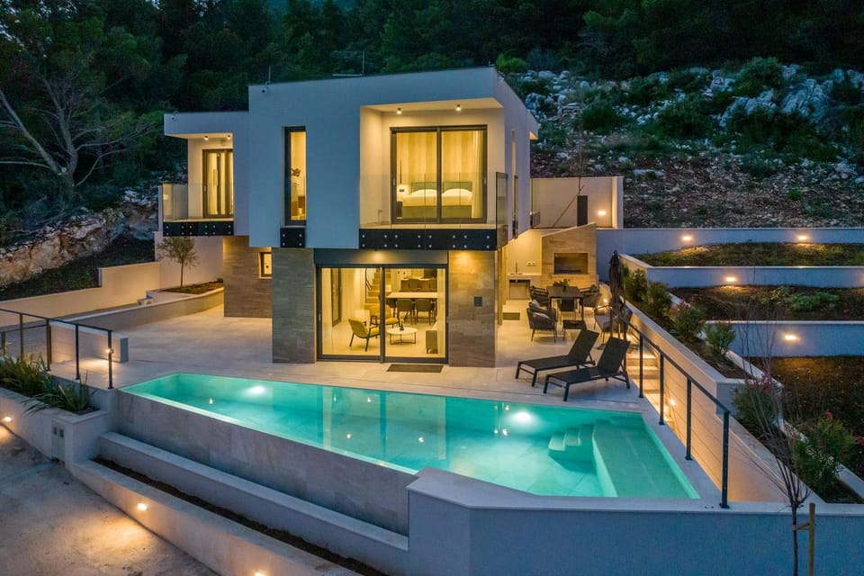 Property building, Patio, Night, Pool view, Swimming pool, sunbed