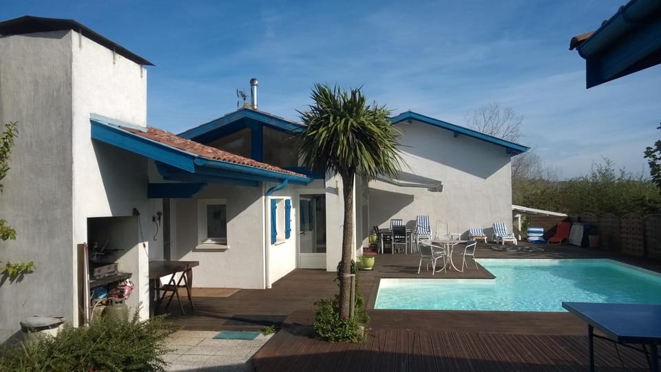 Property building, Living room, Swimming pool