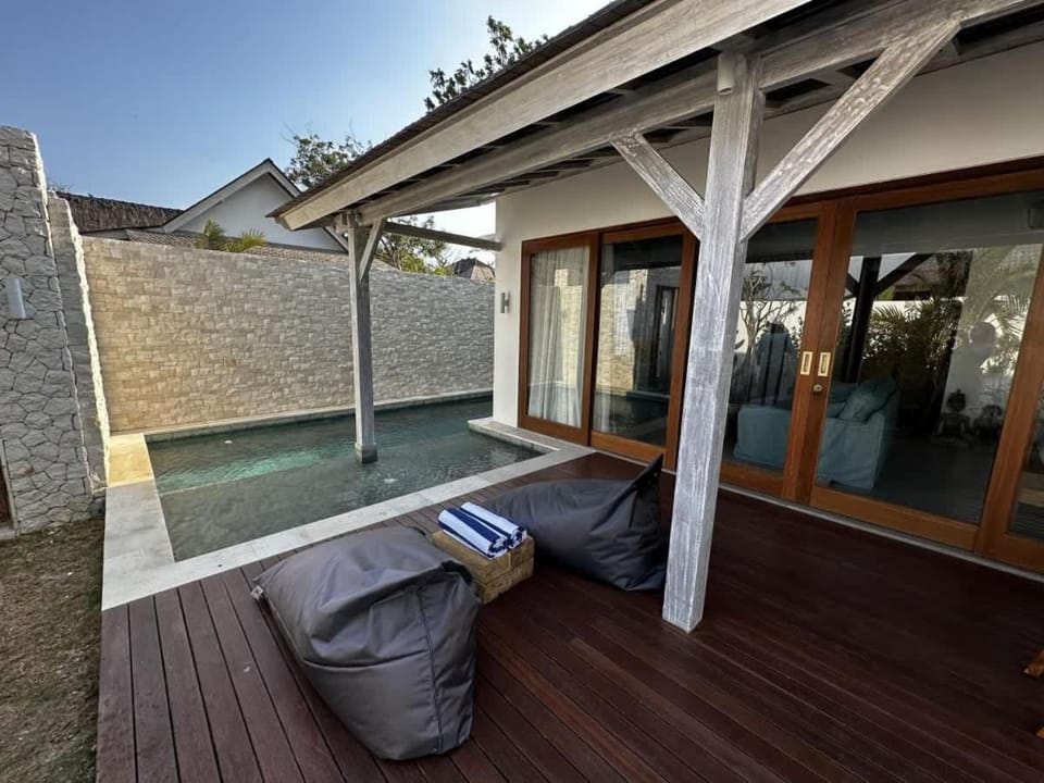 Patio, Day, Natural landscape, Pool view, Swimming pool, sunbed