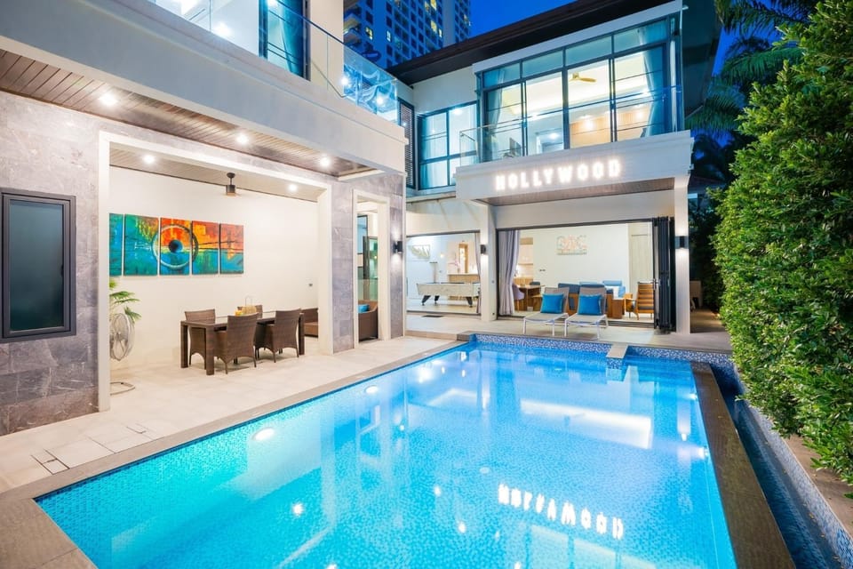 Property building, Patio, Pool view, Swimming pool, sunbed