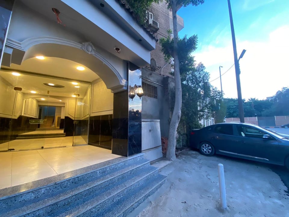 Property building, Day, Parking