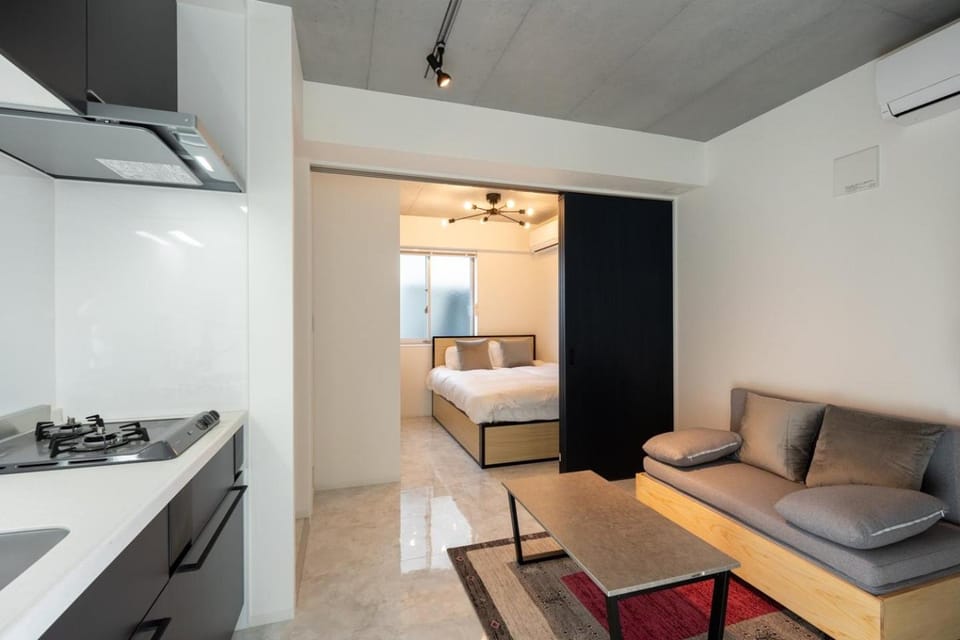 Bed, Kitchen or kitchenette, Living room, Seating area, Bedroom, air conditioner