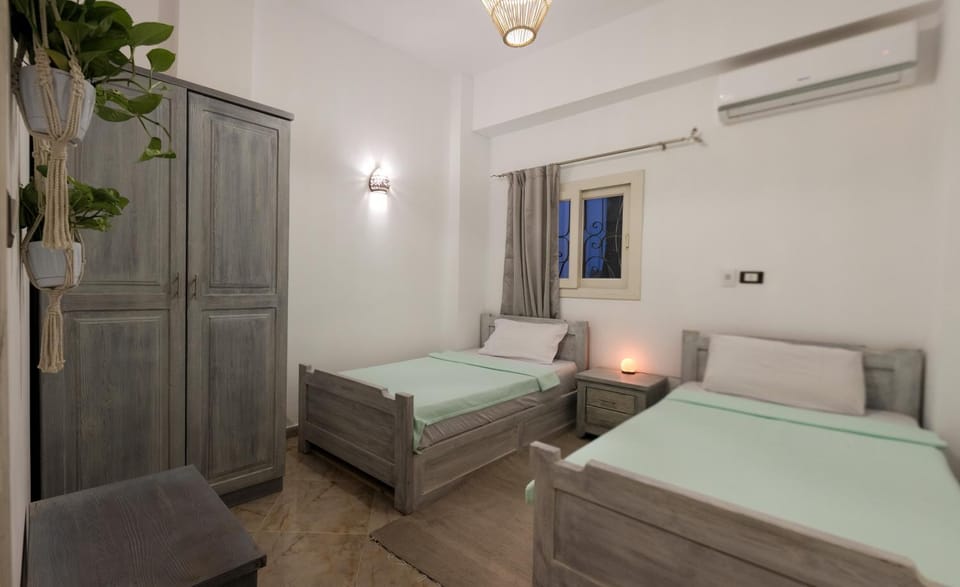 Bed, Photo of the whole room, Bedroom, towels, wardrobe, air conditioner