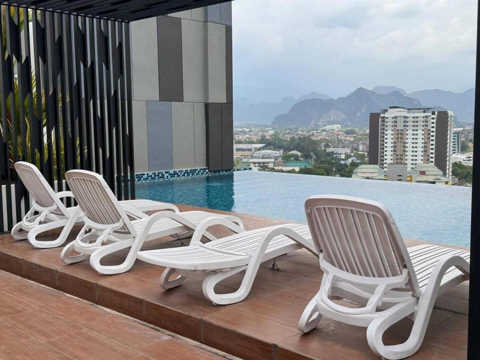 Property building, Day, View (from property/room), Pool view, Swimming pool, sunbed