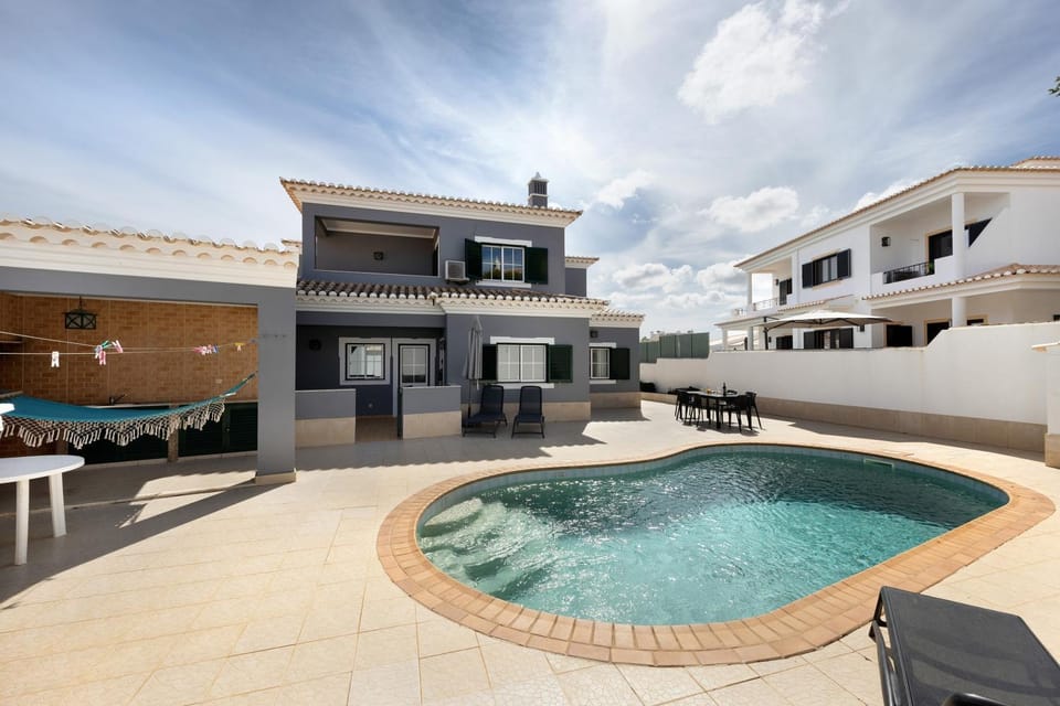 Property building, Living room, Swimming pool