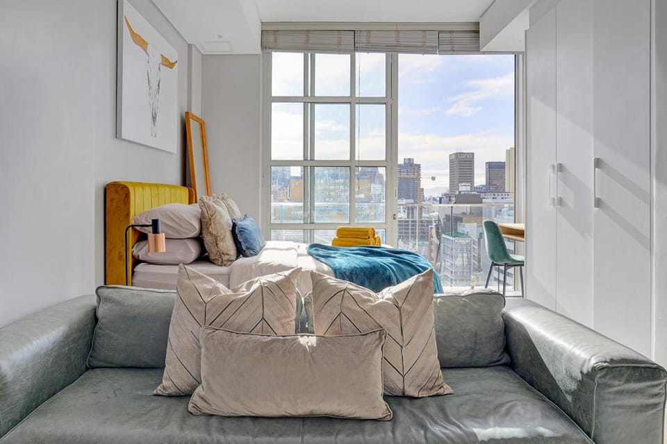 Bed, Living room, Seating area, Bedroom
