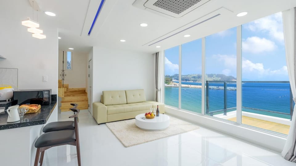 Living room, Seating area, Dining area, Sea view