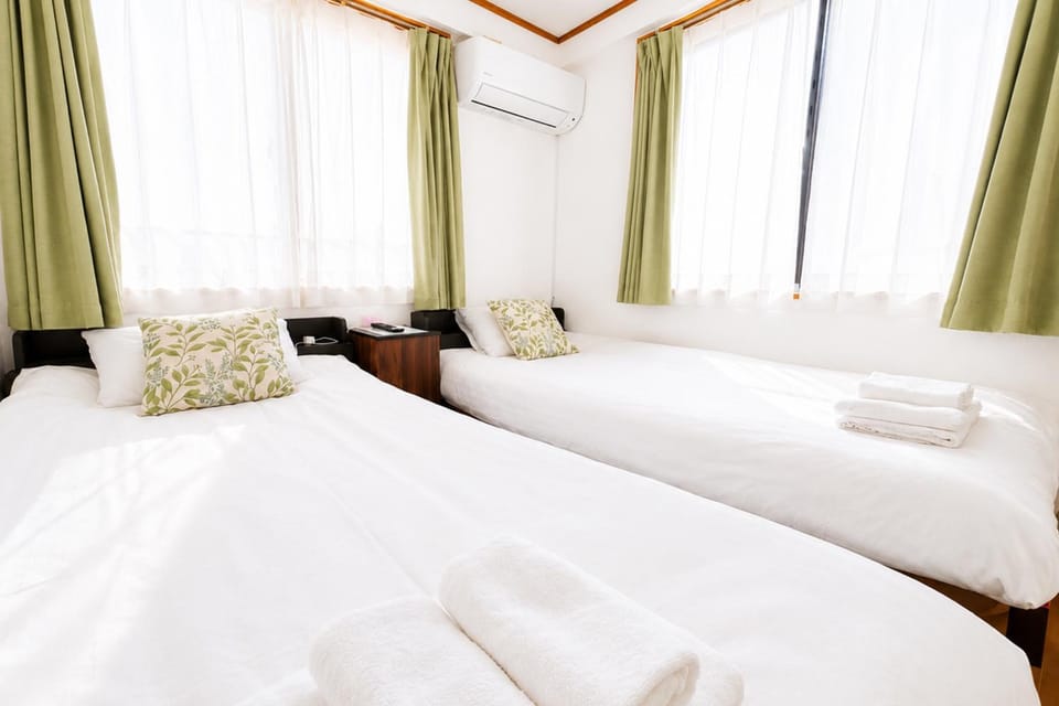 Bed, Photo of the whole room, Bedroom, towels, air conditioner