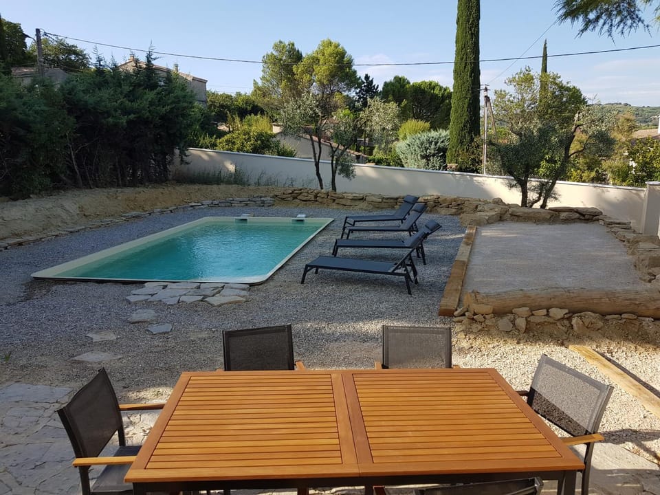 Patio, Day, Natural landscape, Pool view, Swimming pool, sunbed