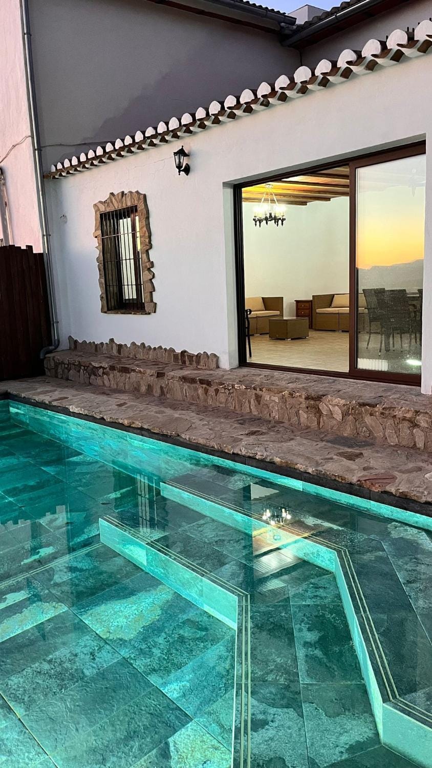 Property building, Living room, Swimming pool