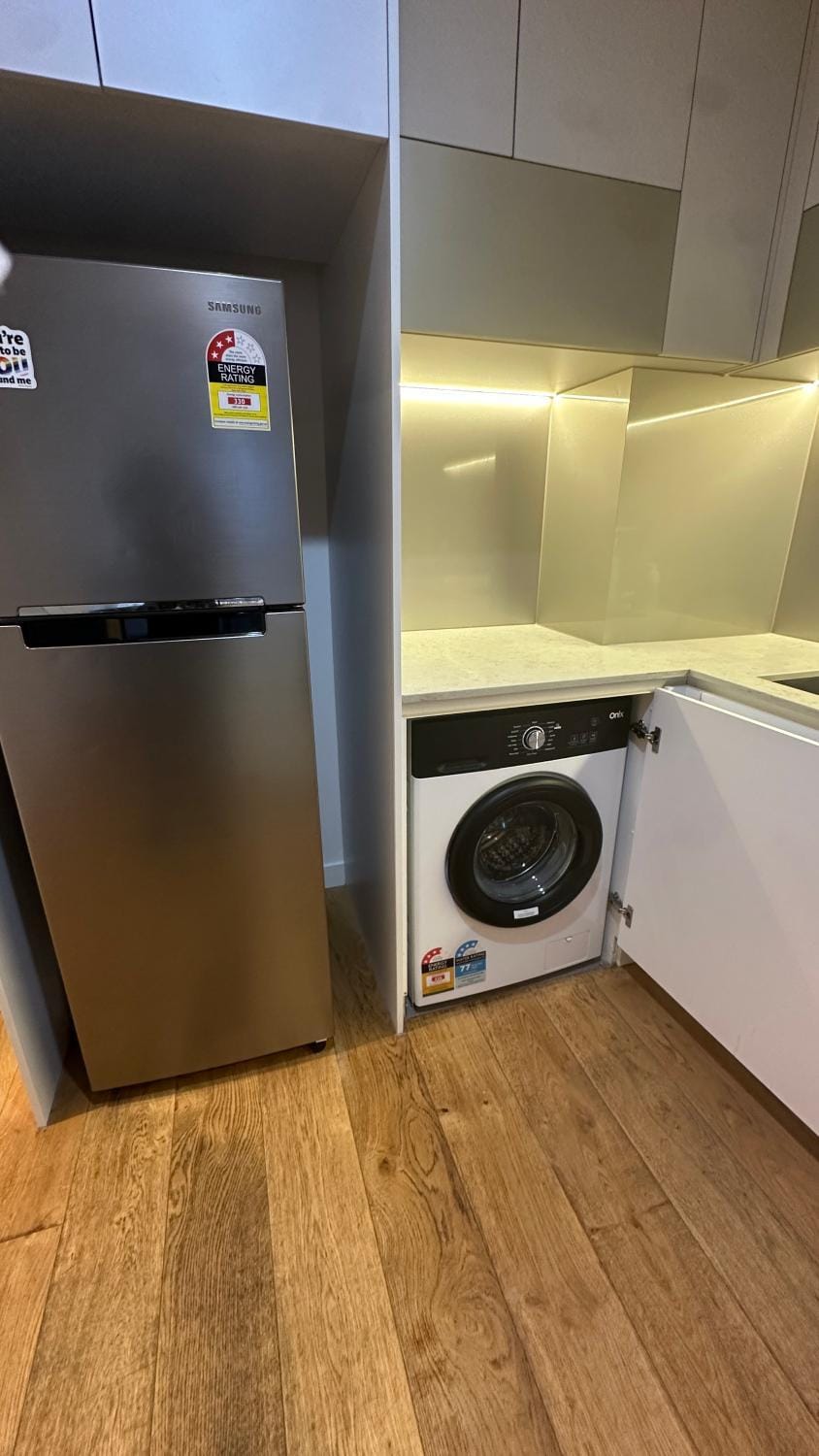 Kitchen or kitchenette, washing machine