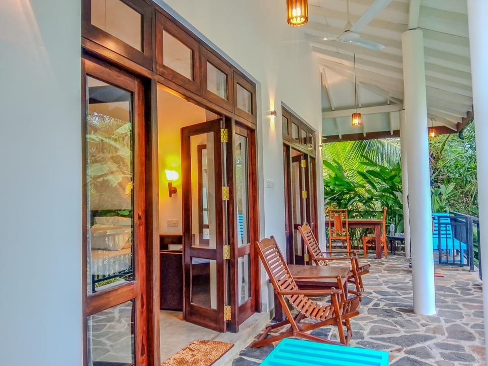 Patio, Day, Garden, View (from property/room), Balcony/Terrace, Living room, Seating area, Garden view, sunbed