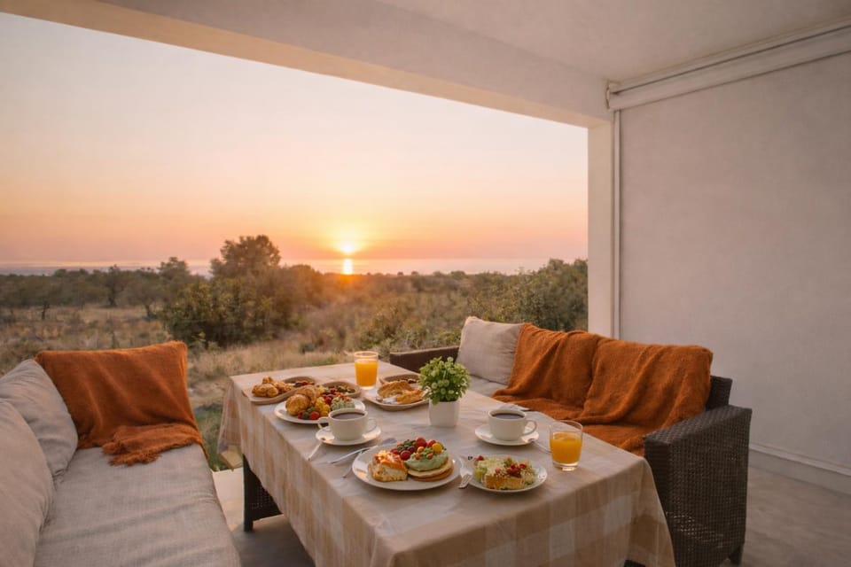Property building, Natural landscape, Living room, Seating area, Garden view, Mountain view, Sea view