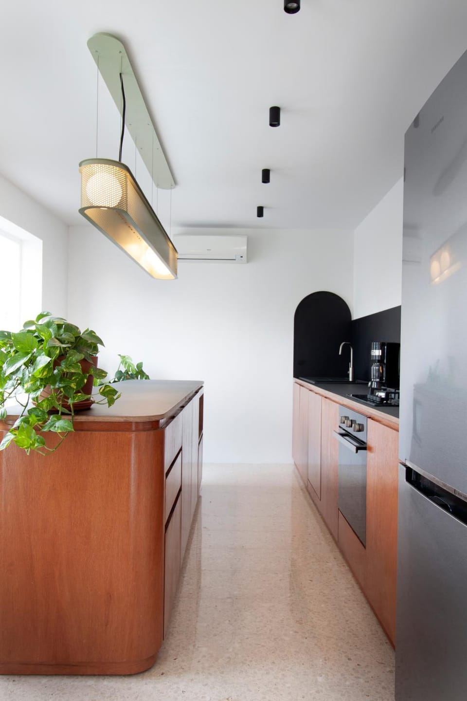 Kitchen or kitchenette, oven, air conditioner
