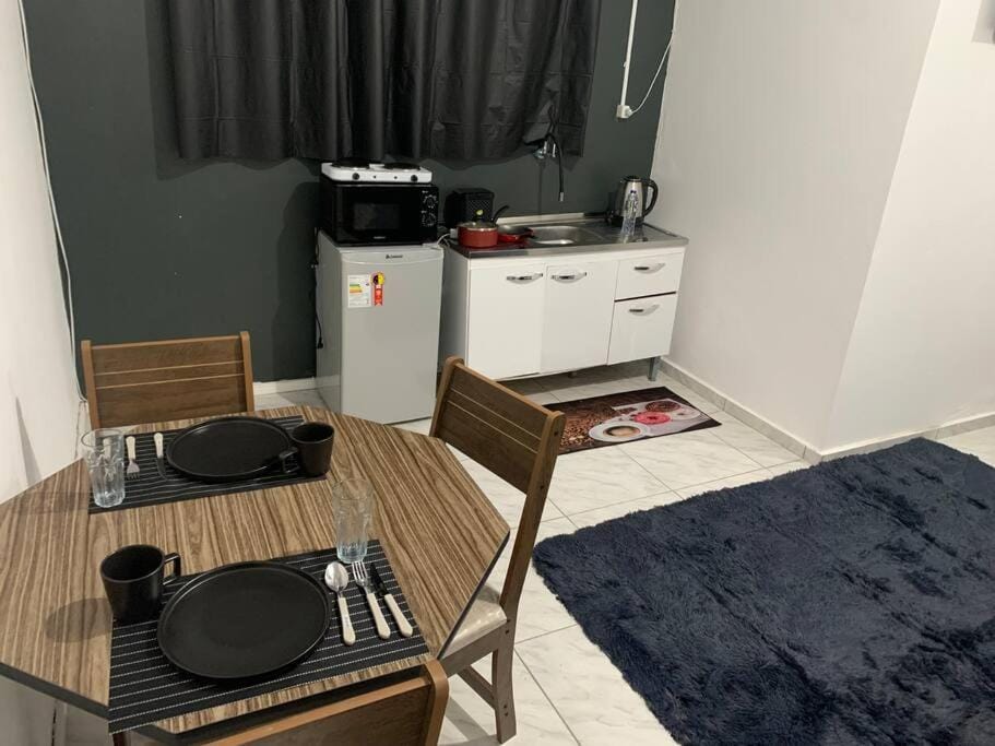 Dining area, minibar, oven, stove